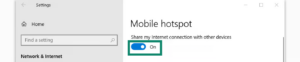 The Windows Mobile hotspot settings screen with a green box highlighting the toggle switch set to On.