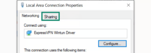 The Local Area Connection Properties window with a green box highlighting the Sharing tab at the top of the dialog box.