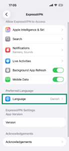 The "Language" option in the ExpressVPN app settings in system settings on iOS.