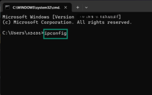 The Command Prompt window on Windows, showing the "ipconfig" command.